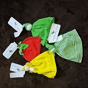 NWT 4 piece hat set for the little looking stylish while being warm.